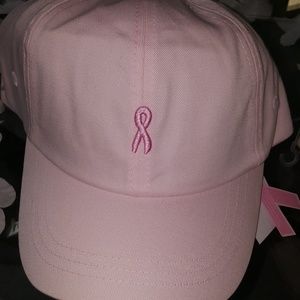 Ball cap.  Pink hat. Pink breast cancer ribbon on front.